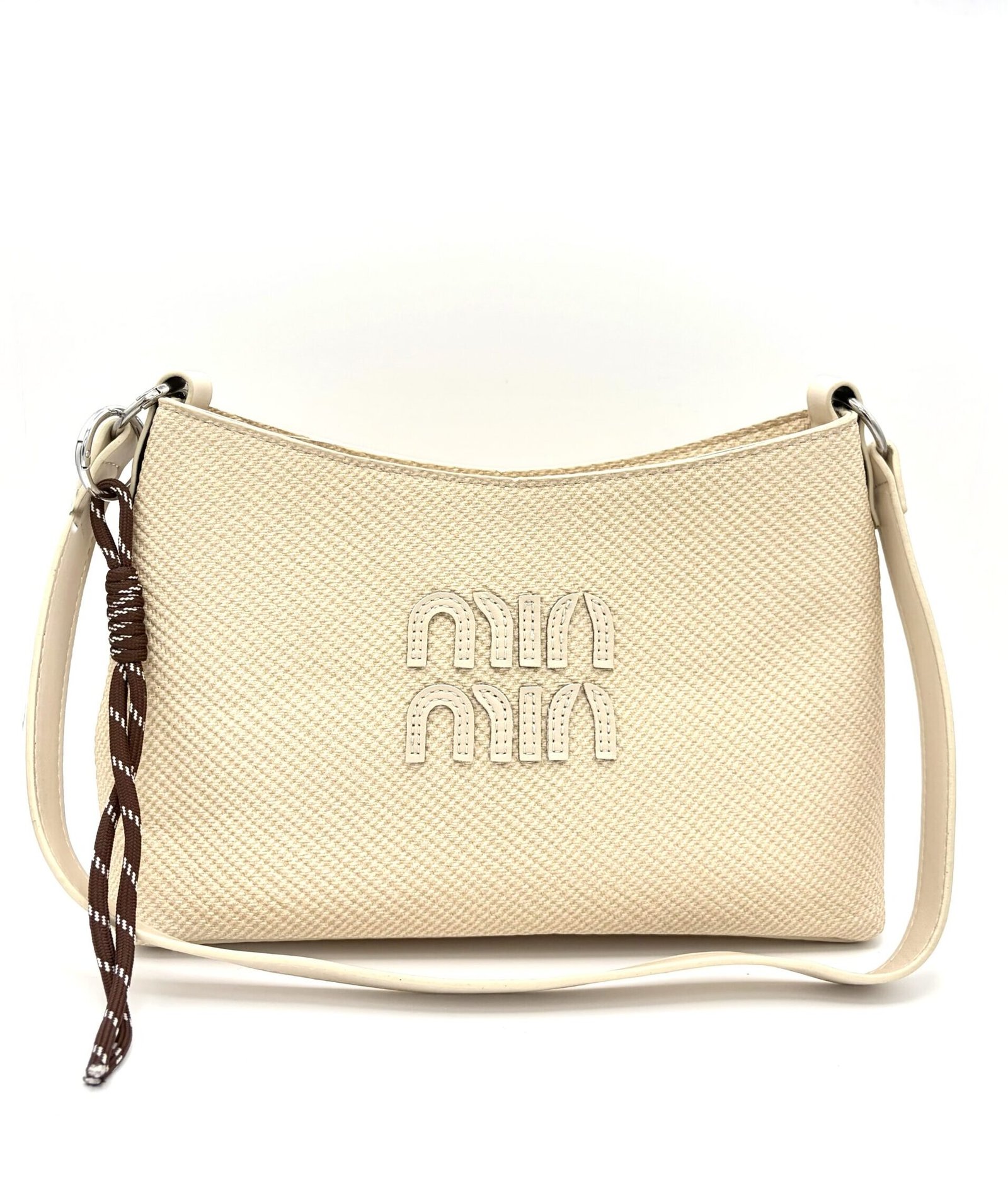 Bolso mediano textura tipo tejido beige